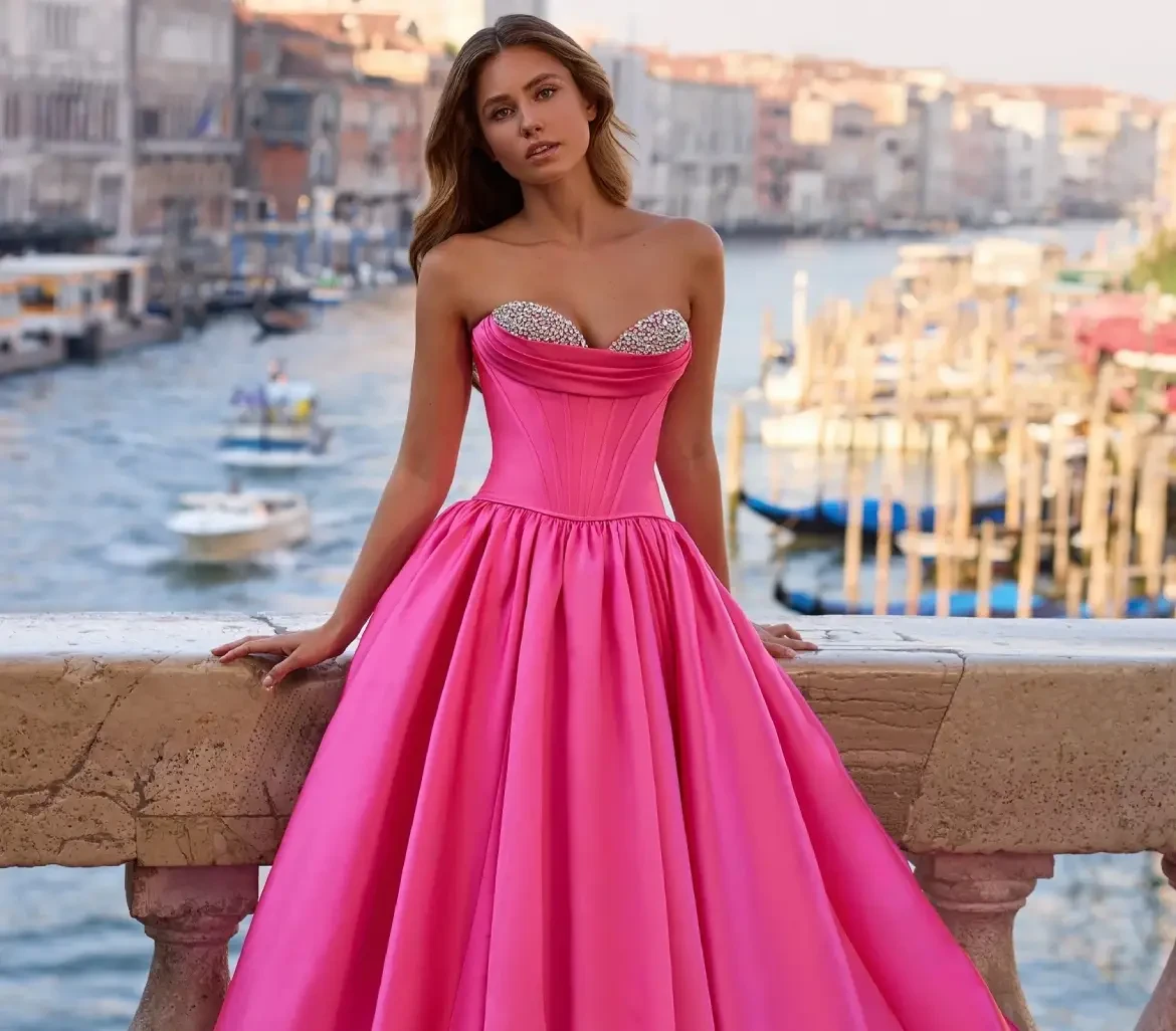 Model wearing a pink Sherri Hill Dress