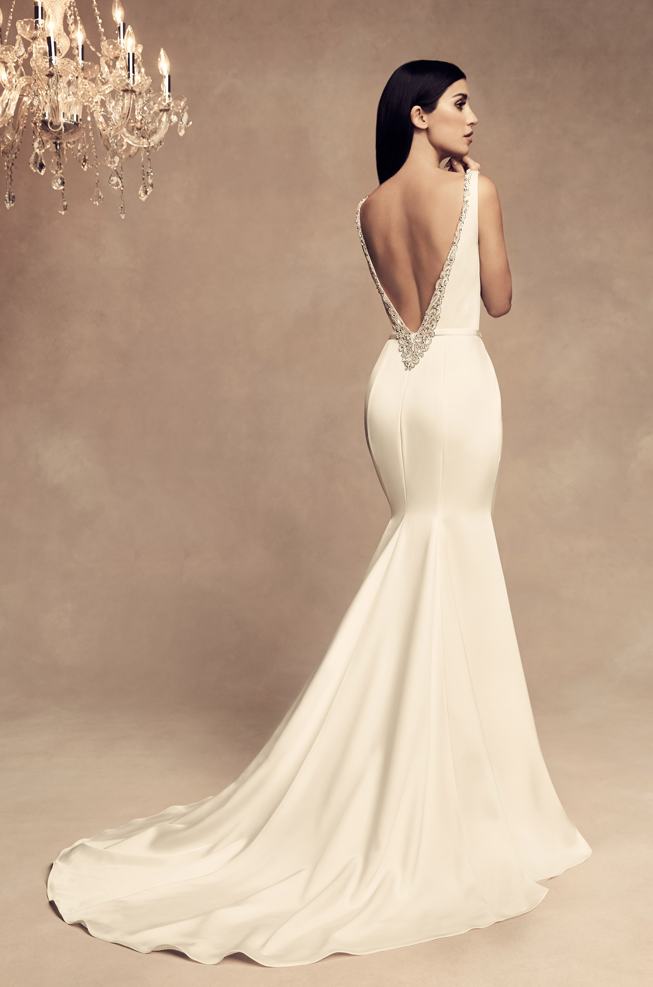 Model wearing a white dress 15