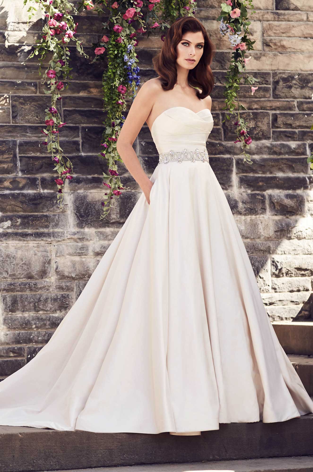 Model wearing a white dress 17
