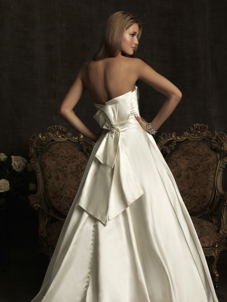 Model wearing a white dress 12