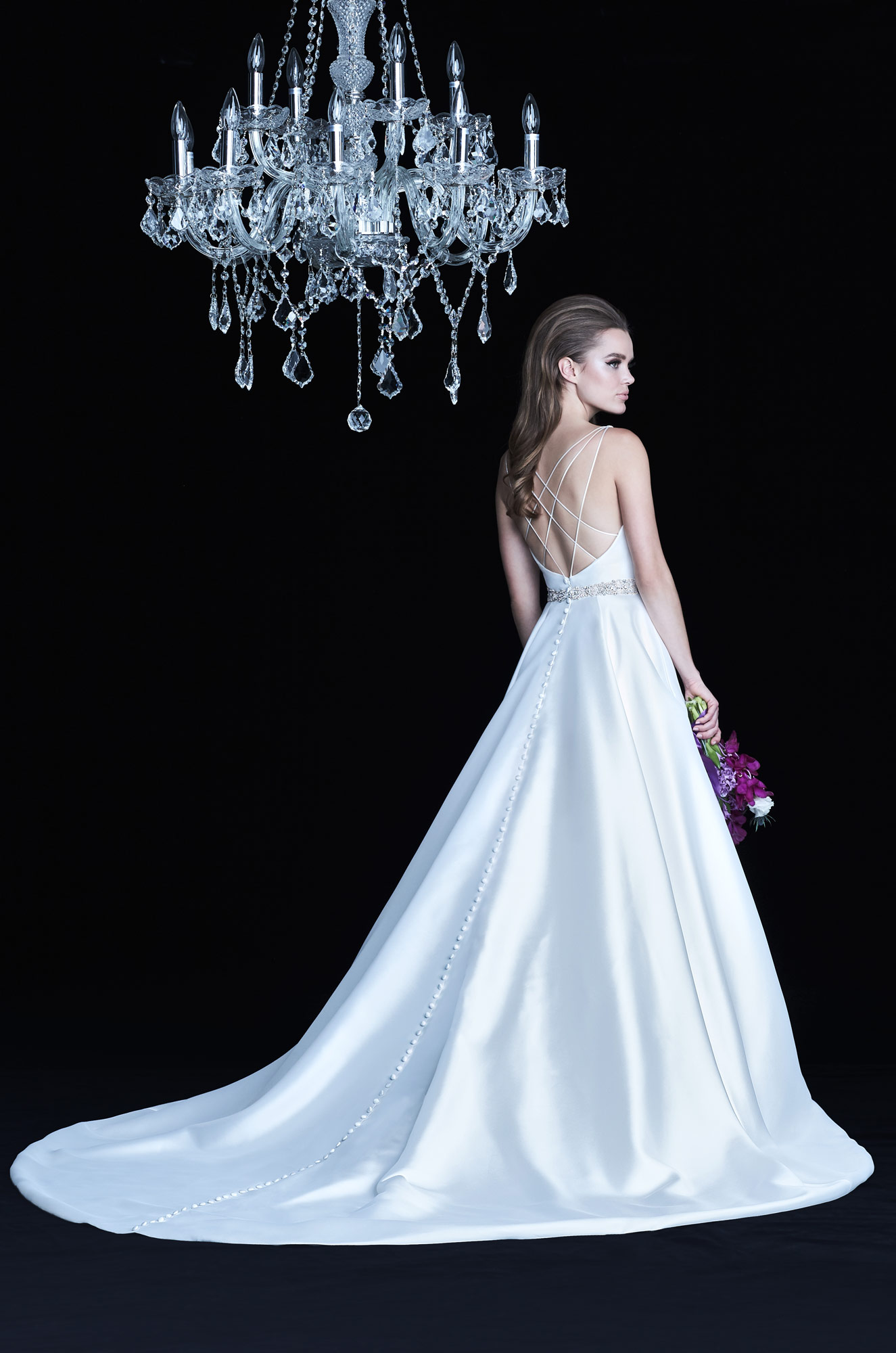 Model wearing a white dress 10