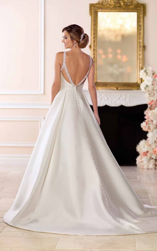 Model wearing a white dress 9